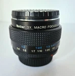 Vivitar 2X Macro Focusing Teleconverter Mc 0.45M 50 Mm With Lens Covers. Fixed Price $20.00.