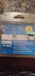 Fluval 404 Impeller And Cover A-20196. Fixed Price $10.00.