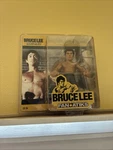 Bruce Lee Action Figure Round Five 6 Inch. Fixed Price $25.31.